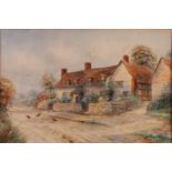 ERNEST POTTER (Early twentieth century) WATERCOLOUR A country lane with cottages Signed lower