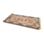 MODERN INDIAN WOOL PILE LARGE RUG with narrow central panel with five medallion pattern and having