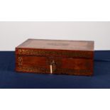REGENCY ROSEWOOD PORTABLE WRITING BOX with elaborate cut brass foliate borders to the top and front,