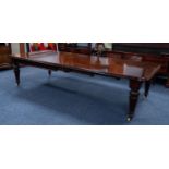 VICTORIAN MAHOGANY WIND-OUT EXTENDING DINING TABLE WITH THREE ADDITIONAL LEAVES, the rounded