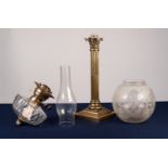 LATE VICTORIAN BRASS OIL LAMP with Corinthian column to stepped square base supporting the cut glass