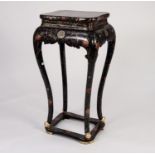 MODERN ORIENTAL BLACK LACQUERED AND POLYCHROME PAINTED TALL JARDINIERE STAND, the shaped oblong