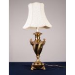 GOOD QUALITY MODERN GILT METAL TABLE LAMP in the form of a two handle pedestal vase with waisted