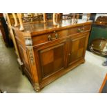 A LARGE GOOD QUALITY OAK SIDEBOARD, WITH CANTED CORNERS, WITH CARVING, TWO DRAWERS OVER TWO