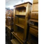 A PINE THREE TIER OPEN BOOKCASE, 2' WIDE AND A PINE SINGLE PEDESTAL DESK WITH TWO DRAWERS