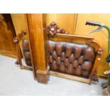 A VICTORIAN MAHOGANY BED HEADBOARD, BUTTON UPHOLSTERED IN BROWN HIDE, 4'4"
