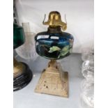 VICTORIAN TABLE OIL LAMP, WITH FLORAL PAINTED BLUE GLASS OIL RESERVOIR CAST AND PIERCED METAL BASE