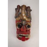 POST-WAR ERA SRI LANKAN PAINTED, CARVED WOODEN FACE MASK, 16" (40.5cm) long