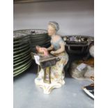 WEDGWOOD AND CO., CHINA FIGURE OF A LADY PLAYING A PIANO