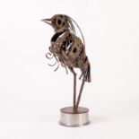 WALENTY PYTEL (b1941) SCULPTED METAL MODEL whimsical bird, on circular metal base Unsigned 16" (40.