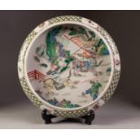 CHINESE LATE QING DYNASTY PORCELAIN SHALLOW BOWL with turned in rim, decorated in famille vert