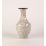 ANTIQUE CHINESE PORCELAIN VASE with grey crackled glaze, ovular body, tall waisted neck, the top