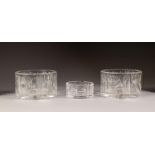 PAIR OF WATERFORD CUT GLASS WINE BOTTLE COASTERS, 3 ¼? (8.2cm) high, 5 ¼? (13.3cm) diameter,