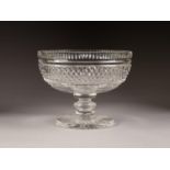 WATERFORD CUT GLASS PEDESTAL DISH, of steep sided form with blade knopped stem and circular foot,