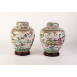 PAIR OF EARLY TWENTIETH CENTURY CHINESE POLYCHROME ENAMELLED PORCELAIN GINGER JARS AND COVERS,