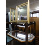 A MODERN OCTAGONAL WALL MIRROR IN GREY AND GILT WOOD FRAME AND A GILT FRAMED TRIPLE TOILET MIRROR (