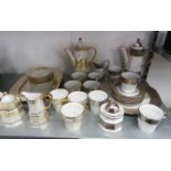 TWO TWENTIETH CENTURY TEA SERVICES FROM THAILAND, HAND DECORATED (32 PIECES)