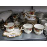 A 26 PIECE ROYAL ALBERT 'OLD COUNTRY ROSES' PATTERN TEA SERVICE WITH TEAPOT (26)