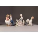 LLADRO PORCELAIN MODEL OF A RECLINING LADY with a dove and TWO OTHERS (3)