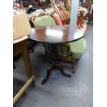 A REPRODUCTION MAHOGANY CIRCULAR FLIP-TOP TABLE ON TRIPOD BASE