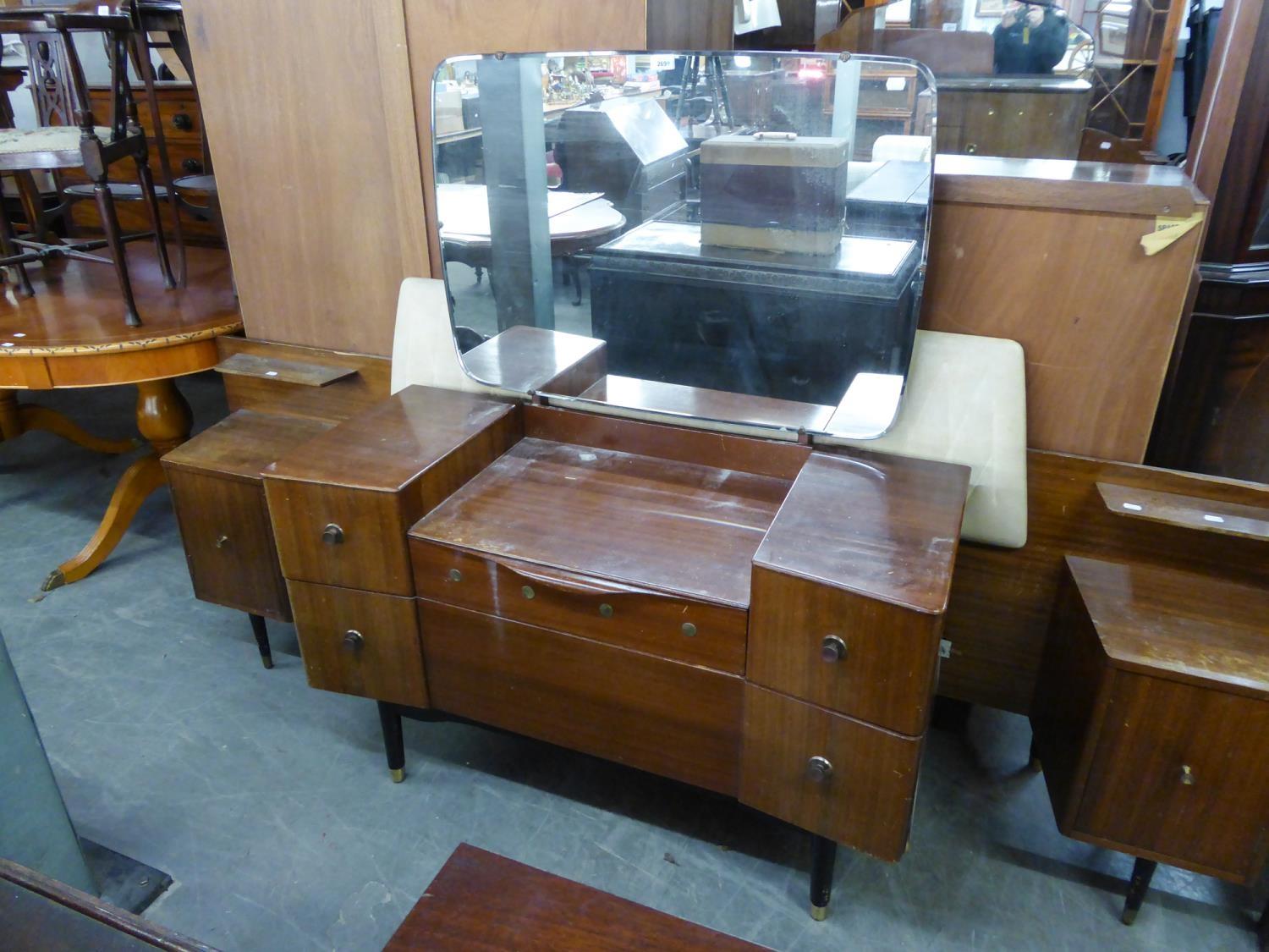 C.W.S. 1960's TEAK BEDROOM SUITE OF THREE PIECES ON 'T.V.' LEGS, VIZ, TWO DOOR WARDROBE, DRESSING