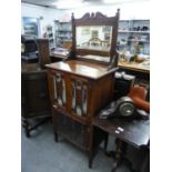 LATE VICTORIAN CARVED WALNUT MUSIC CABINET WITH RAISED MIRROR BACK