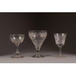 PAIR OF NINETEENTH CENTURY WINE GLASSES, each with wheel cut meandering vine border, knopped stem