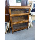 KENRICK JEFFERSON AND SON MAHOGANY THREE TIER SECTIONAL BOOKCASE WITH LEAD LIGHT FRONTS