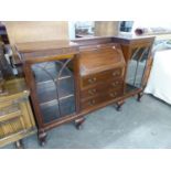 A MAHOGANY CHIPPENDALE STYLE SIDE-BY-SIDE BUREAU BOOKCASE, ON STUMP CABRIOLE SUPPORTS, 6' WIDE AND A