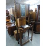 AN OAK HALLSTAND WITH MIRROR AND GLOVE BOX