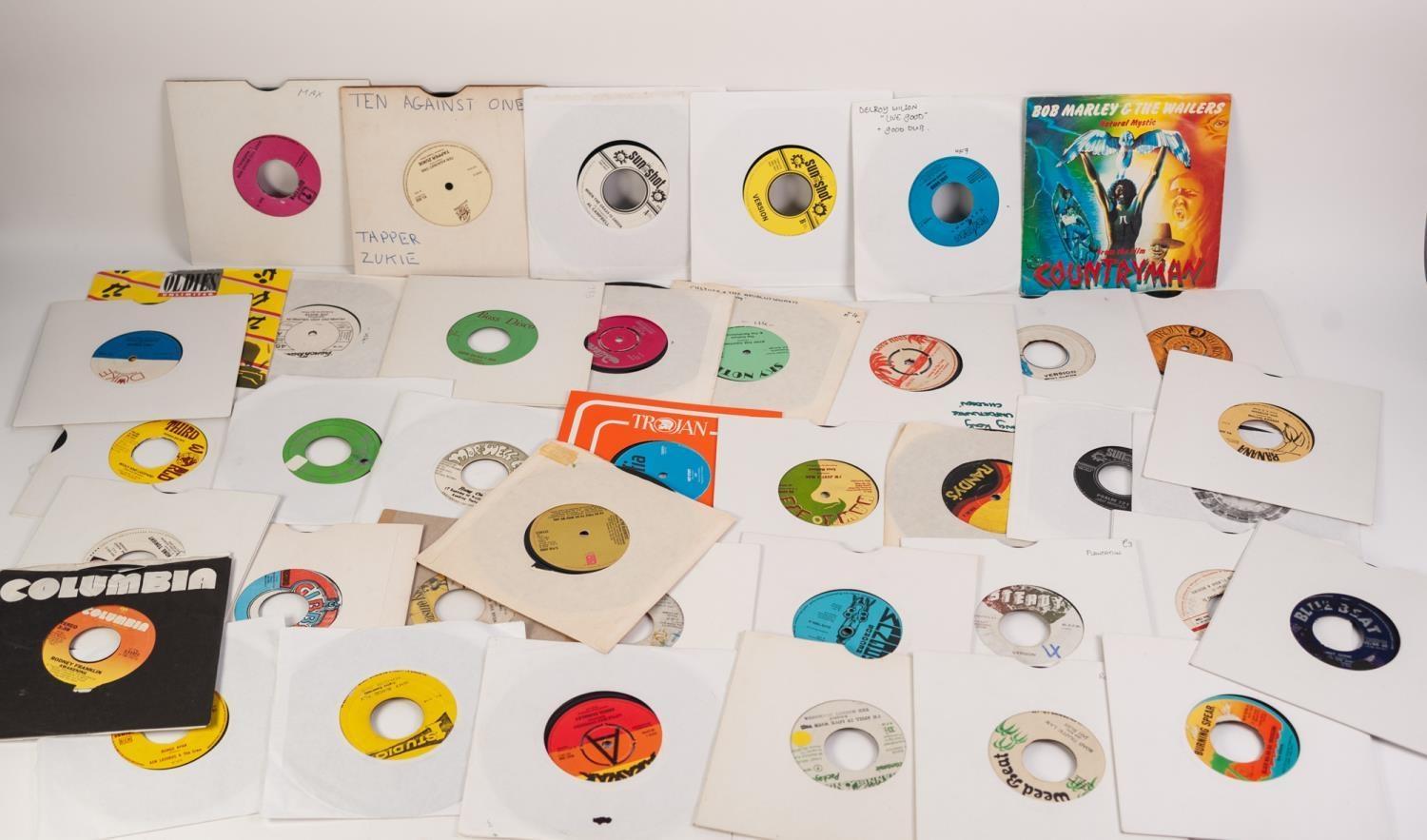 VINYL RECORDS, REGGAE SINGLES 45RPM- A diverse mixture of approximately 40 Reggae singles by various