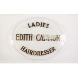 ?EDITH CANNON, LADIES HAIRDRESSER?, VINTAGE OVAL GLASS BEVEL EDGED MURAL SALON SIGN with black edged
