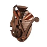 MODERN HAND SCULPTED MIXED METAL WALL MOUNTED APPLIQUE OF MUSICAL INSTRUMENTS comprising a cello,