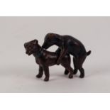 PAIR OF COLD PAINTED BRONZE MODELS OF COPULATING DOGS, 2? (5.1cm) high, indistinct stamped mark, (2)
