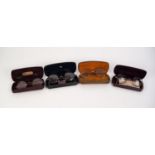 FOUR CASED PAIRS OF ROUND FRAMED VINTAGE SPECTACLES, in tortoiseshell, one pair stamped 10 ct to the