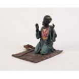 FRANZ BERGMAN (Austria) COLD PAINTED BRONZE ARAB FIGURE kneeling in prayer upon a rug his staff