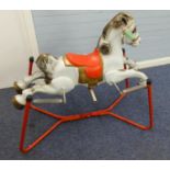 MOBO CIRCA 1950 PRAIRIE KING PAINTED TINPLATE ROCKING HORSE retained on the tubular base with four