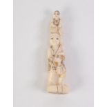 SMALL JAPANESE MEIJI PERIOD CARVED IVORY OKIMONO OF A CHILD upon the shoulders of a male figure