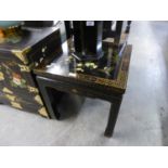 A FAR EASTERN LACQUERED SQUARE TOPPED COFFEE TABLE