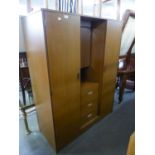 A MODERN WOOD EFFECT SMALL COMBINATION DOUBLE WARDROBE AND DRESSING TABLE WITH THREE CENTRE DRAWERS,