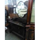 OAK DRESSING CHEST HAVING TWO SHORT AND TWO LONG DRAWERS WITH BRASS DROP HANDLES AND MIRROR AND