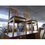 A PAIR OF MODERN GERMAN LIGHT BEECH WOOD RAIL BACK SINGLE CHAIRS AND A PAIR OF HARDWOOD WINDSOR