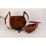 LEATHER, FUR HIDE AND CANVAS CARTRIDGE BAG with four pairs of pendant straps, having metal ring