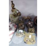 RESIN FIGURE 'MASSAI' KNELT WITH A POT, FIVE RESIN MODELS OF COTTAGES BY SHUDEHILL GIFTWARE AND A
