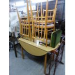 A SET OF FOUR SCHREIBER BENTWOOD KITCHEN DINING CHAIRS WITH RAIL BACKS AND A CIRCULAR DINING TABLE