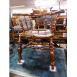 19TH CENTURY HARDWOOD TUB SHAPED ARMCHAIR WITH SPINDLE BACK, PANEL SEAT, ON HEAVY TURNED LEGS WITH