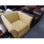 A MODERN DARK BROWN LEATHER ARMCHAIR, AND A BEIGE FABRIC ARMCHAIR (2)