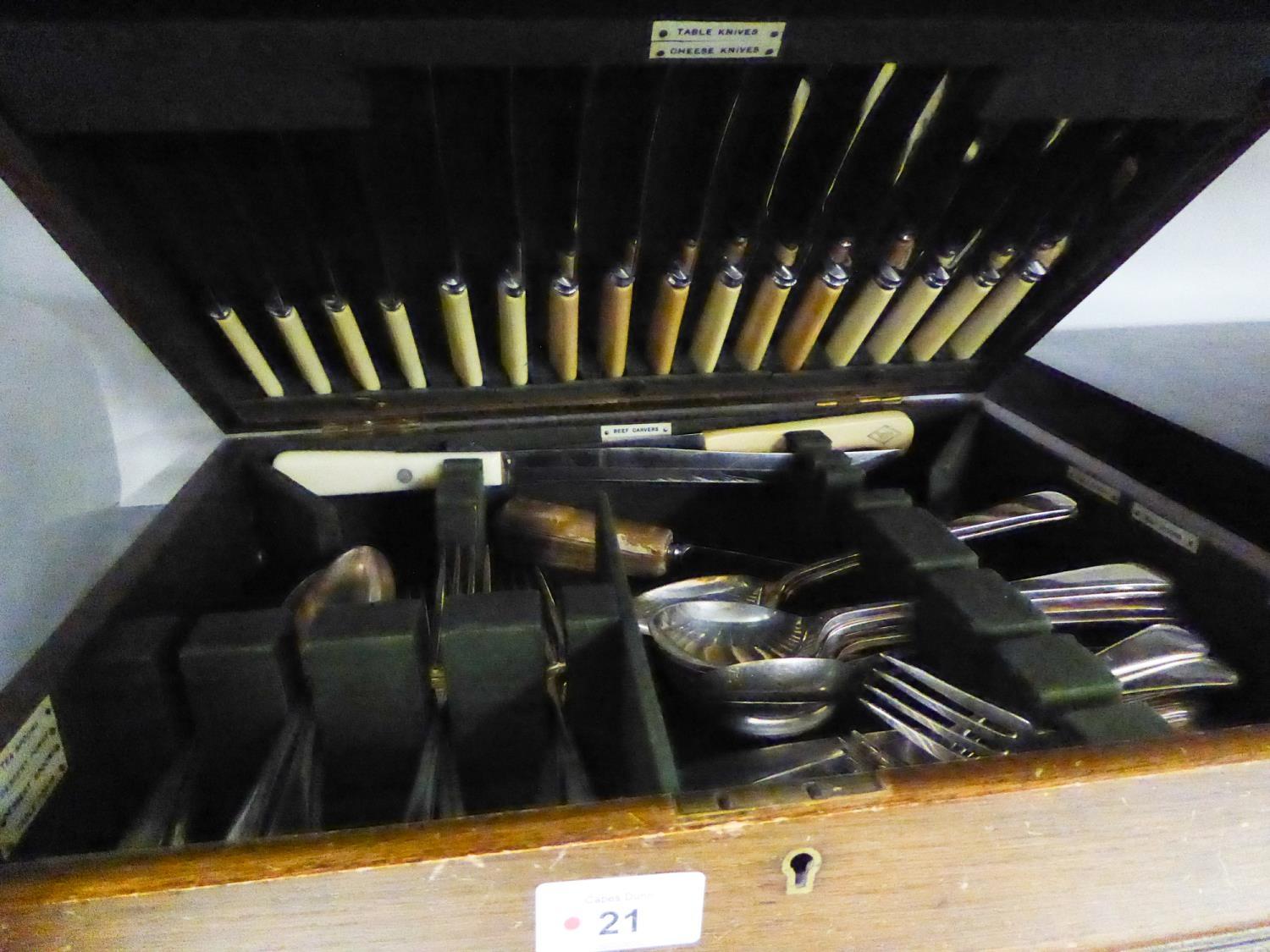 AN OAK CANTEEN WITH TABLE SERVICE OF ELECTROPLATE CUTLERY FOR EIGHT PERSONS