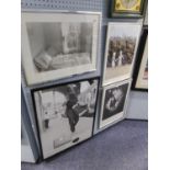 TWO FRAMED BLACK AND WHITE PHOTOGRAPHIC POSTER PRINTS OF YOUNG CHILDREN; AFTER LILO RAYMOND,