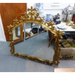 AN ORNATE GILT FRAMED OVERMANTEL MIRROR, 116cm high x 123cm wide